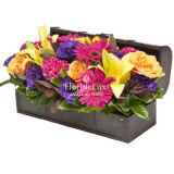Gerbera, crini, lisianthus in cufar – Premium
